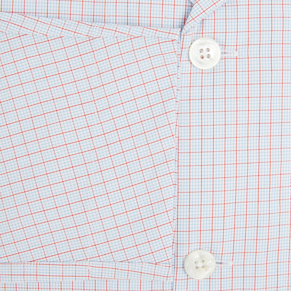 The Turnbull & Asser Red Multi Graph Check Pyjama Shirt is a stylish long-sleeved loungewear piece, ideal for comfortable and elegant nightwear.