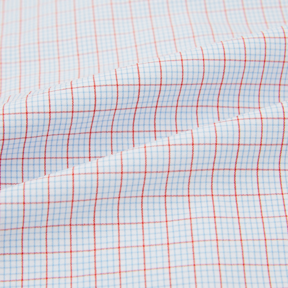 The Turnbull & Asser Red Multi Graph Check Pyjama Shirt is a stylish long-sleeved loungewear piece, ideal for comfortable and elegant nightwear.