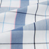 View 5 of product The Blue Blazer Check Pyjama Trousers by Turnbull & Asser feature a straight-leg fit, elastic waistband with drawstring, and white, blue, and gray plaid pattern. Comfortable with side pockets, they are shown laid flat against a white background.