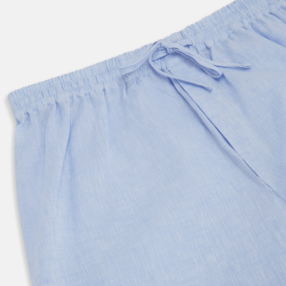 Turnbull & Asser Pale Blue Linen Pyjama Trousers feature an elastic waistband with drawstring, relaxed straight-leg fit, and no visible patterns or embellishments, displayed flat on a white background.