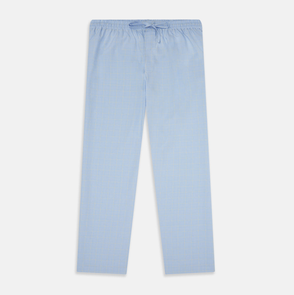 The Blue Prince of Wales Check Pyjama Trousers by Turnbull & Asser, featuring a subtle check pattern, elastic waistband, and drawstring tie, are laid flat on a white background.