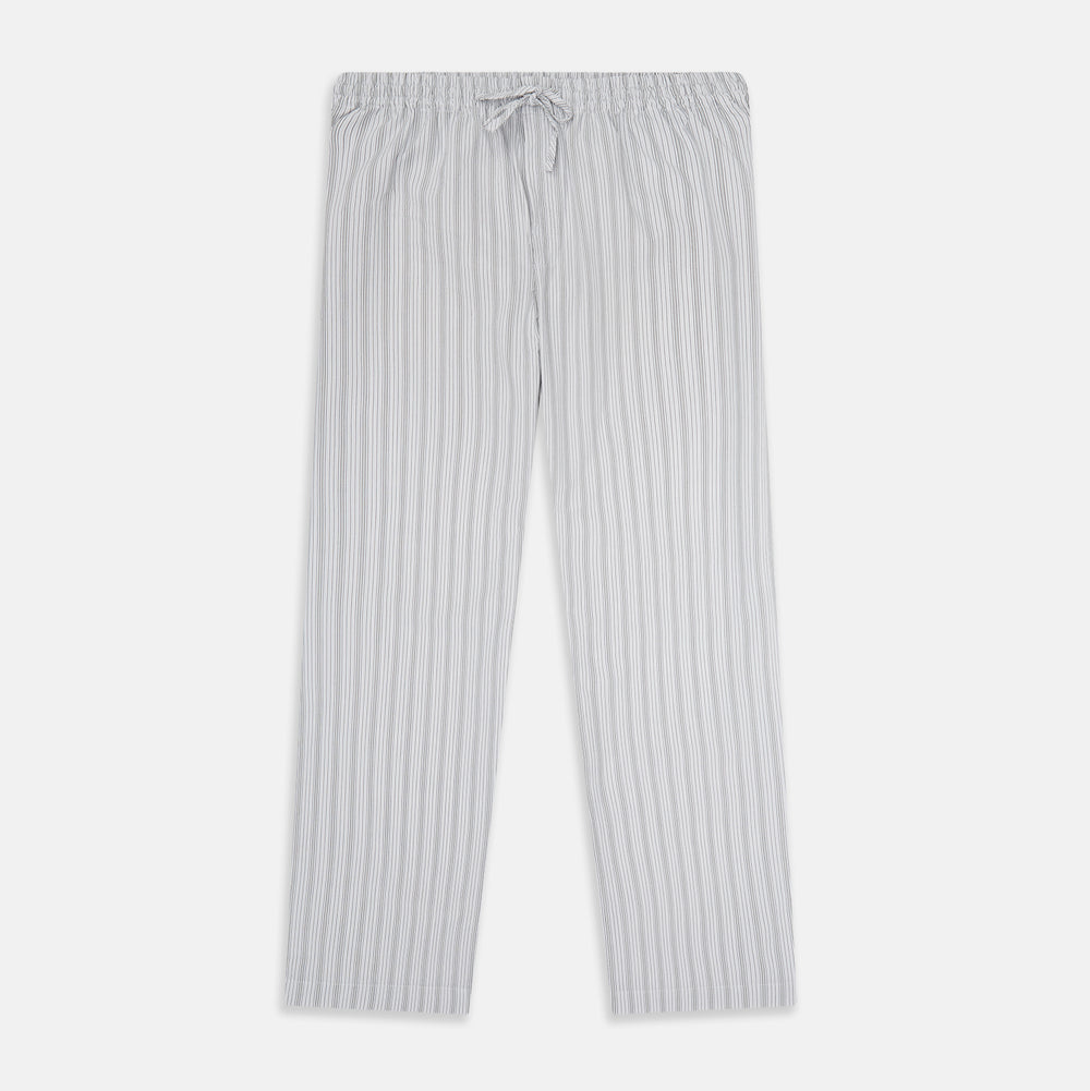 Turnbull & Asser’s Grey Fine Track Stripe Pyjama Trousers feature vertical white pinstripes, a relaxed fit, and an elastic drawstring waistband—ideal for comfortable sleepwear.