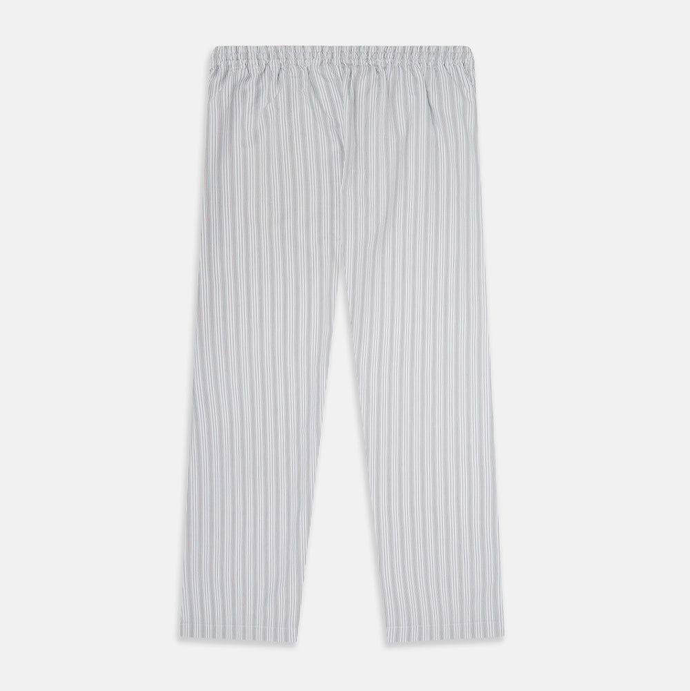 Turnbull & Asser’s Grey Fine Track Stripe Pyjama Trousers feature vertical white pinstripes, a relaxed fit, and an elastic drawstring waistband—ideal for comfortable sleepwear.