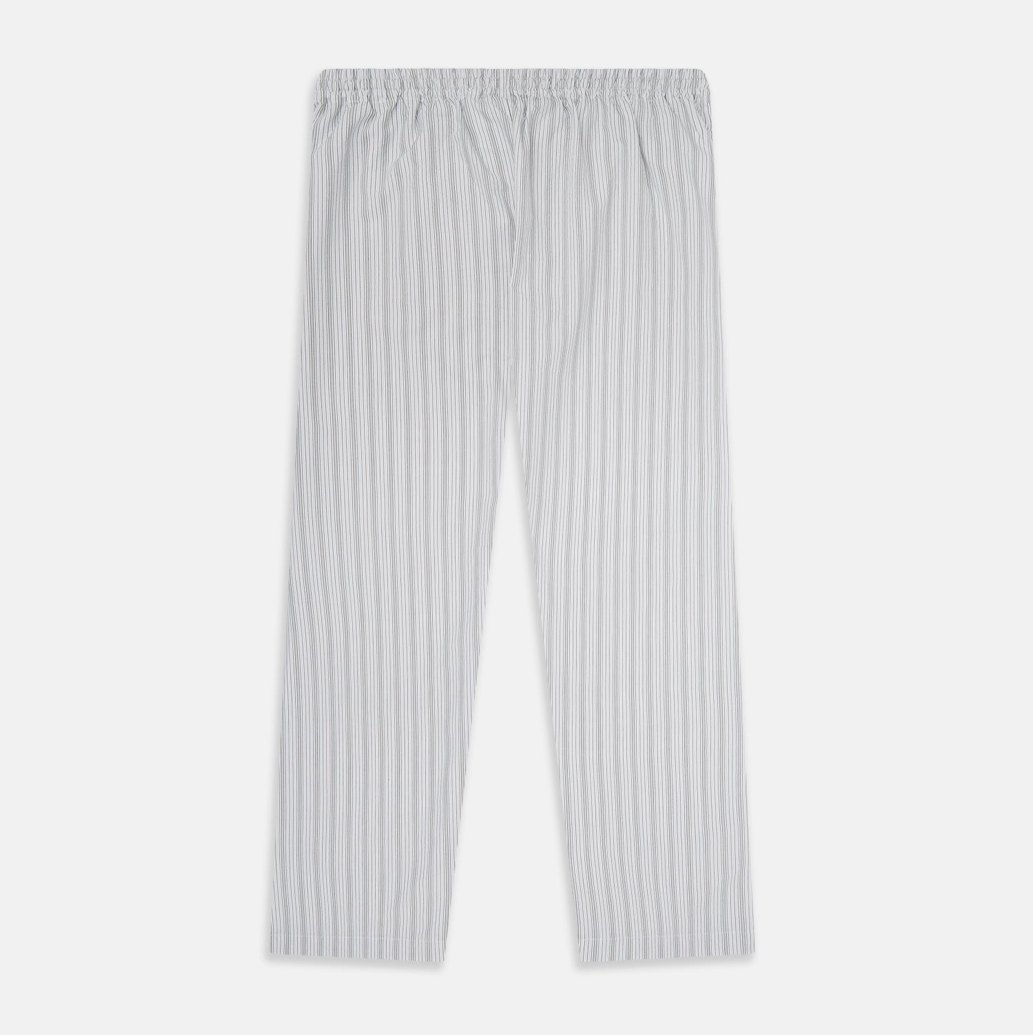 View 3 of product Turnbull & Asser’s Grey Fine Track Stripe Pyjama Trousers feature vertical white pinstripes, a relaxed fit, and an elastic drawstring waistband—ideal for comfortable sleepwear.