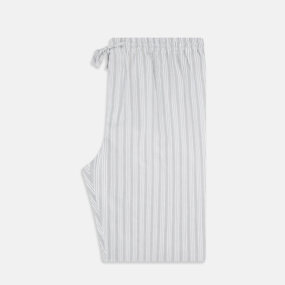 Turnbull & Asser’s Grey Fine Track Stripe Pyjama Trousers feature vertical white pinstripes, a relaxed fit, and an elastic drawstring waistband—ideal for comfortable sleepwear.