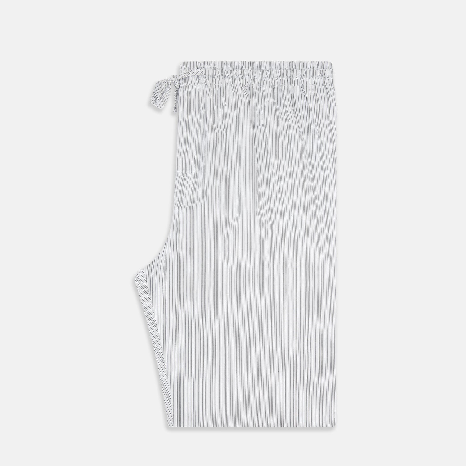 View 4 of product Turnbull & Asser’s Grey Fine Track Stripe Pyjama Trousers feature vertical white pinstripes, a relaxed fit, and an elastic drawstring waistband—ideal for comfortable sleepwear.