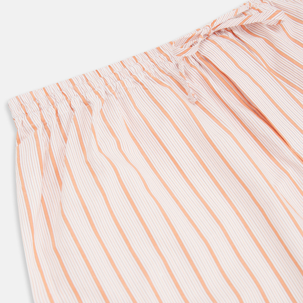 Turnbull & Asser's Orange Multi Track Stripe Pyjama Trousers feature vertical stripes, an elastic waistband, and a drawstring tie—ideal for comfort lovers. Displayed flat on a plain white background.