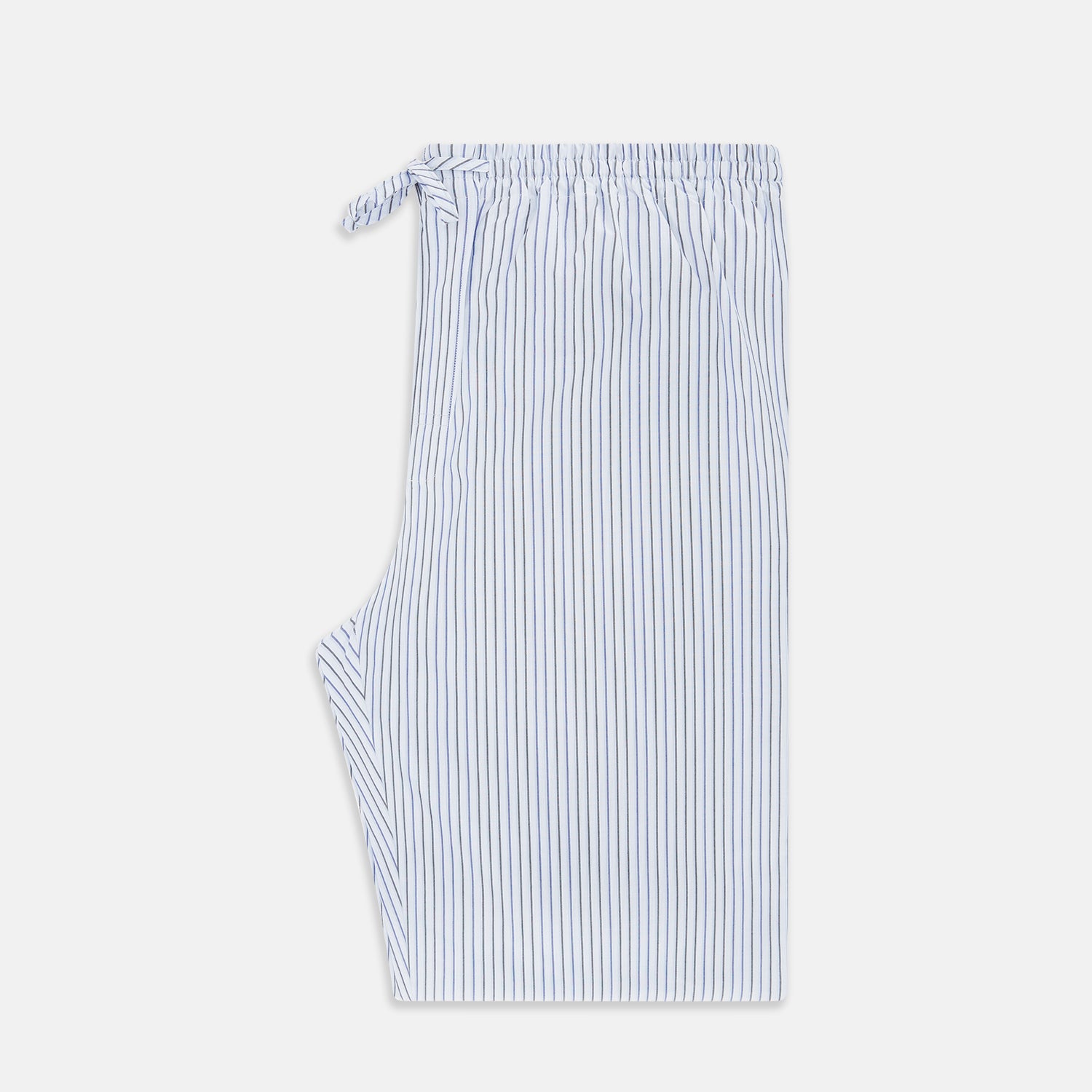 View 4 of product Turnbull & Asser Blue Shadow Pinstripe Pyjama Trousers, featuring blue and white vertical stripes and an elastic waistband, are displayed flat on a white background.