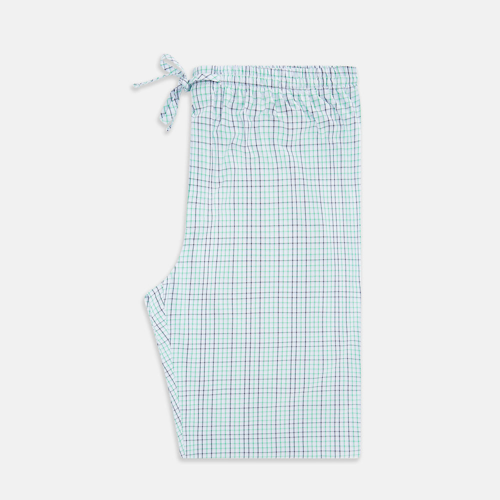 Turnbull & Asser Green and Blue Shadow Check Pyjama Trousers feature an elastic waistband and drawstring, shown flat on a white background. Ideal to pair with your favorite cotton T-shirt for a cozy night's sleep.