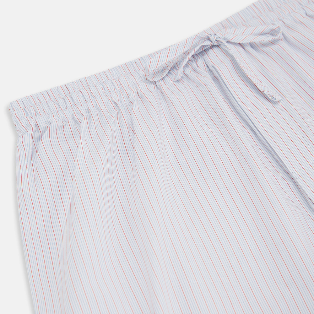 Turnbull & Asser's Red Multi Pinstripe Pyjama Trousers feature vibrant stripes and a comfy elastic waistband with drawstring—ideal for stylish, comfortable sleepwear. Laid flat on a white background.