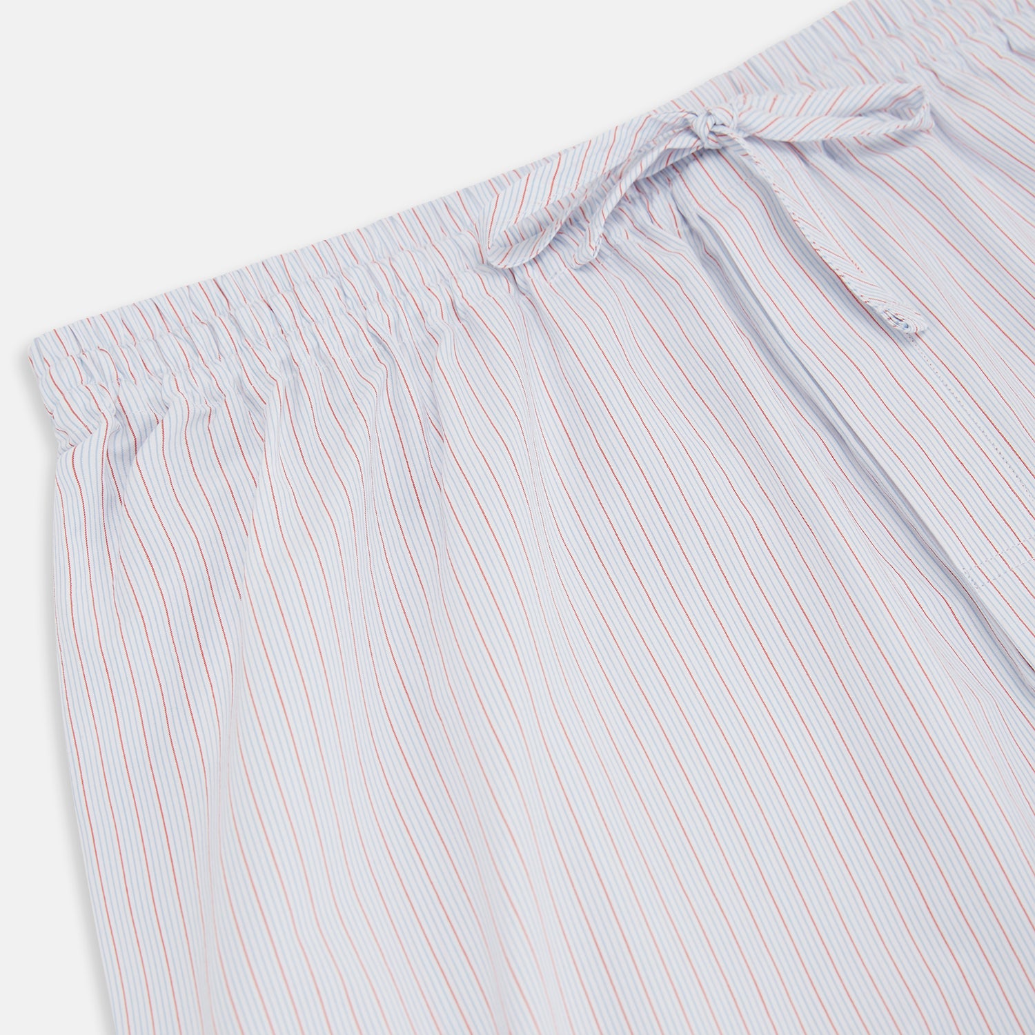 View 2 of product Turnbull & Asser's Red Multi Pinstripe Pyjama Trousers feature vibrant stripes and a comfy elastic waistband with drawstring—ideal for stylish, comfortable sleepwear. Laid flat on a white background.