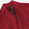 View 2 of product The Turnbull & Asser Burgundy Spot Silk Gown features a shawl collar, front pocket, and matching belt—ideal for relaxation—shown on a white background.