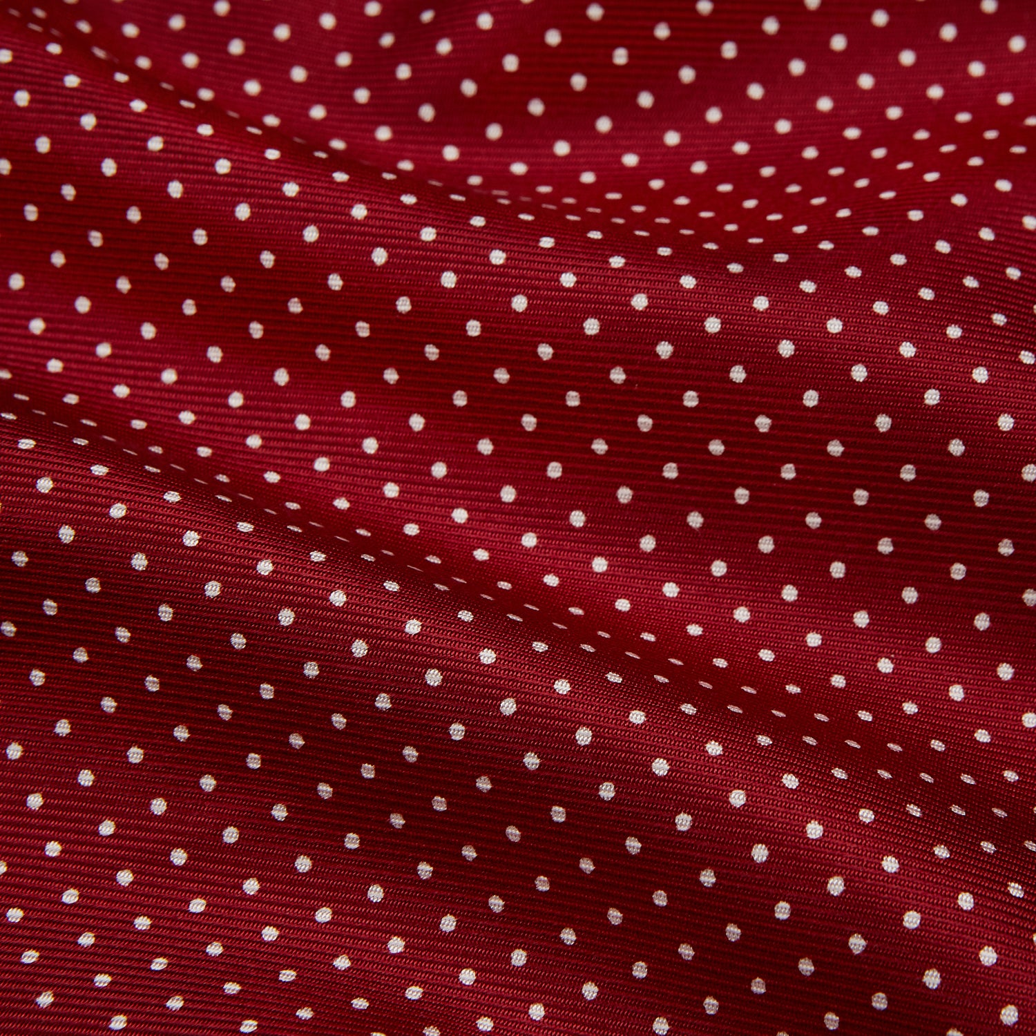View 5 of product The Turnbull & Asser Burgundy Spot Silk Gown features a shawl collar, front pocket, and matching belt—ideal for relaxation—shown on a white background.