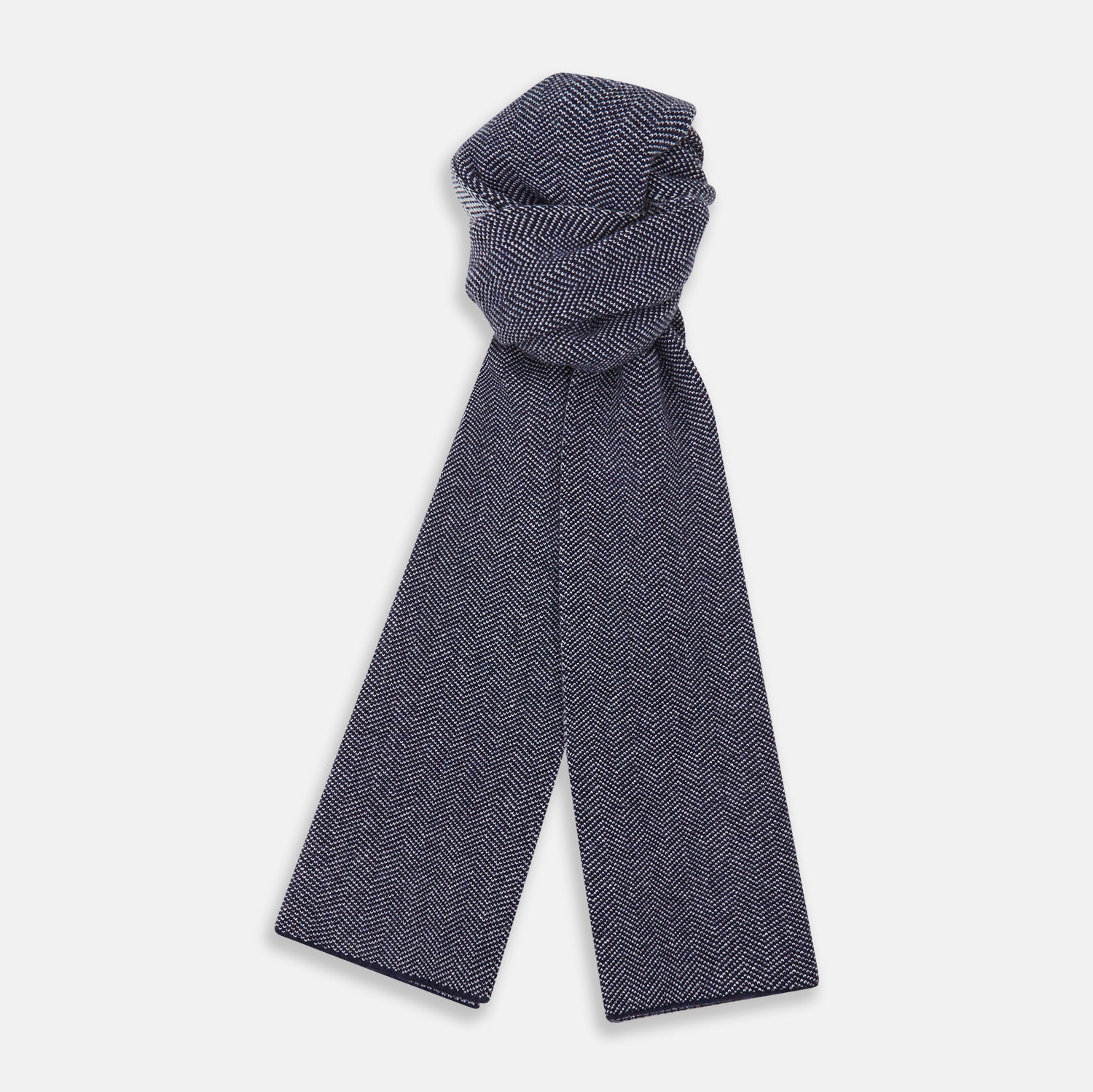 View 1 of product The Turnbull & Asser Reversible Navy and White Herringbone Cashmere Scarf is a timeless winter accessory, featuring an elegant two-tone pattern and luxurious softness.