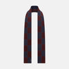 View 1 of product Turnbull & Asser Navy and Burgundy Striped & Checkered Double-Sided Corduroy Padded Scarf in a burgundy and navy blue checkerboard pattern for exceptional warmth.
