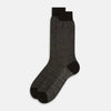 View 2 of product A pair of Turnbull & Asser UK Dark Chocolate Cotton-Linen Mid-Length Socks, featuring a black and gray pattern with black heels, toes, and cuffs, laid flat on a white background.
