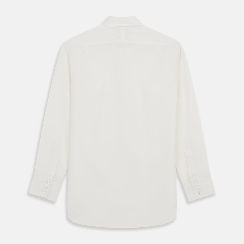 The Turnbull & Asser Cream Silk Mayfair Shirt features long sleeves, a classic collar, button-down front, and buttoned cuffs, shown laid flat on a white background.