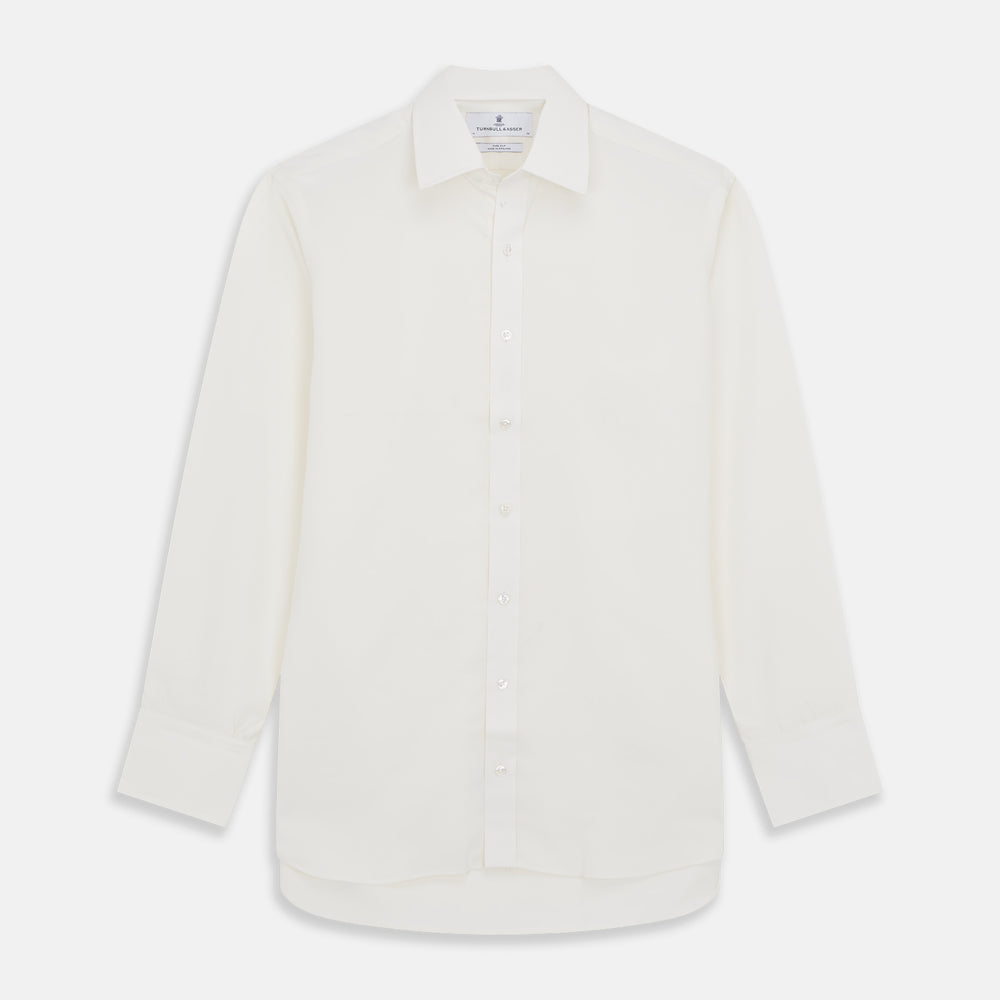 The Turnbull & Asser Cream Silk Mayfair Shirt features long sleeves, a classic collar, button-down front, and buttoned cuffs, shown laid flat on a white background.