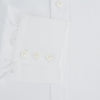 View 4 of product The Turnbull & Asser Plain White Cotton Shirt features a T&A collar, 3-button cuffs, and a timeless minimalist design, shown on a plain white background.