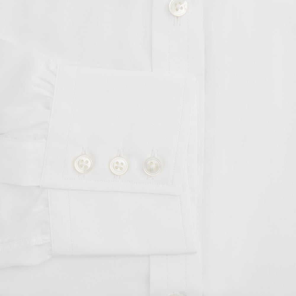 The Turnbull & Asser Two-Fold 200 White Cotton Shirt features a T&A collar and 3-button cuffs, crafted from breathable cotton and shown on a plain white background.