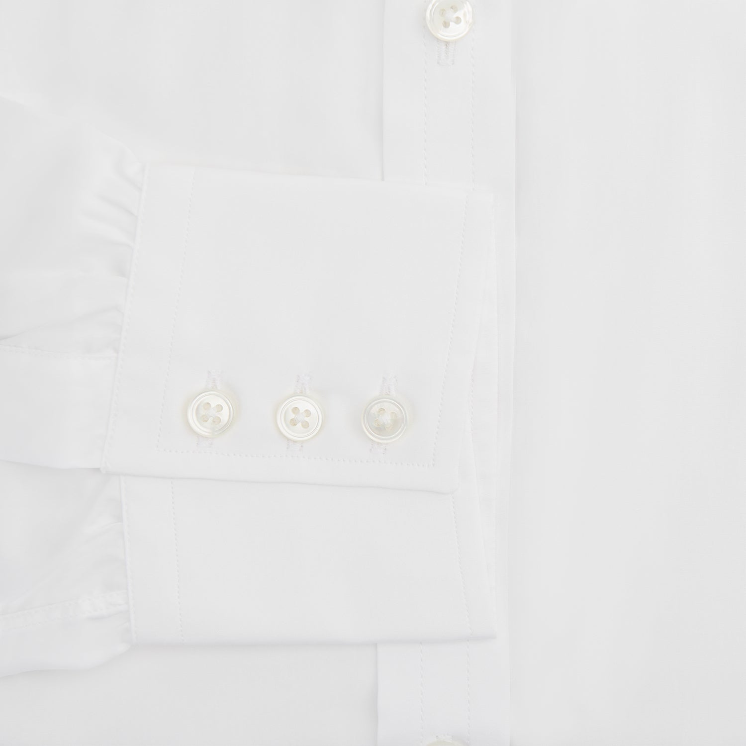 View 3 of product The Turnbull & Asser Two-Fold 200 White Cotton Shirt features a T&A collar and 3-button cuffs, crafted from breathable cotton and shown on a plain white background.