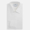 View 4 of product The Turnbull & Asser White Marcella Dress Shirt features a T&A collar, double cuffs, a classic bib front, and a button-down design—ideal for formal occasions. Displayed against a plain white background.