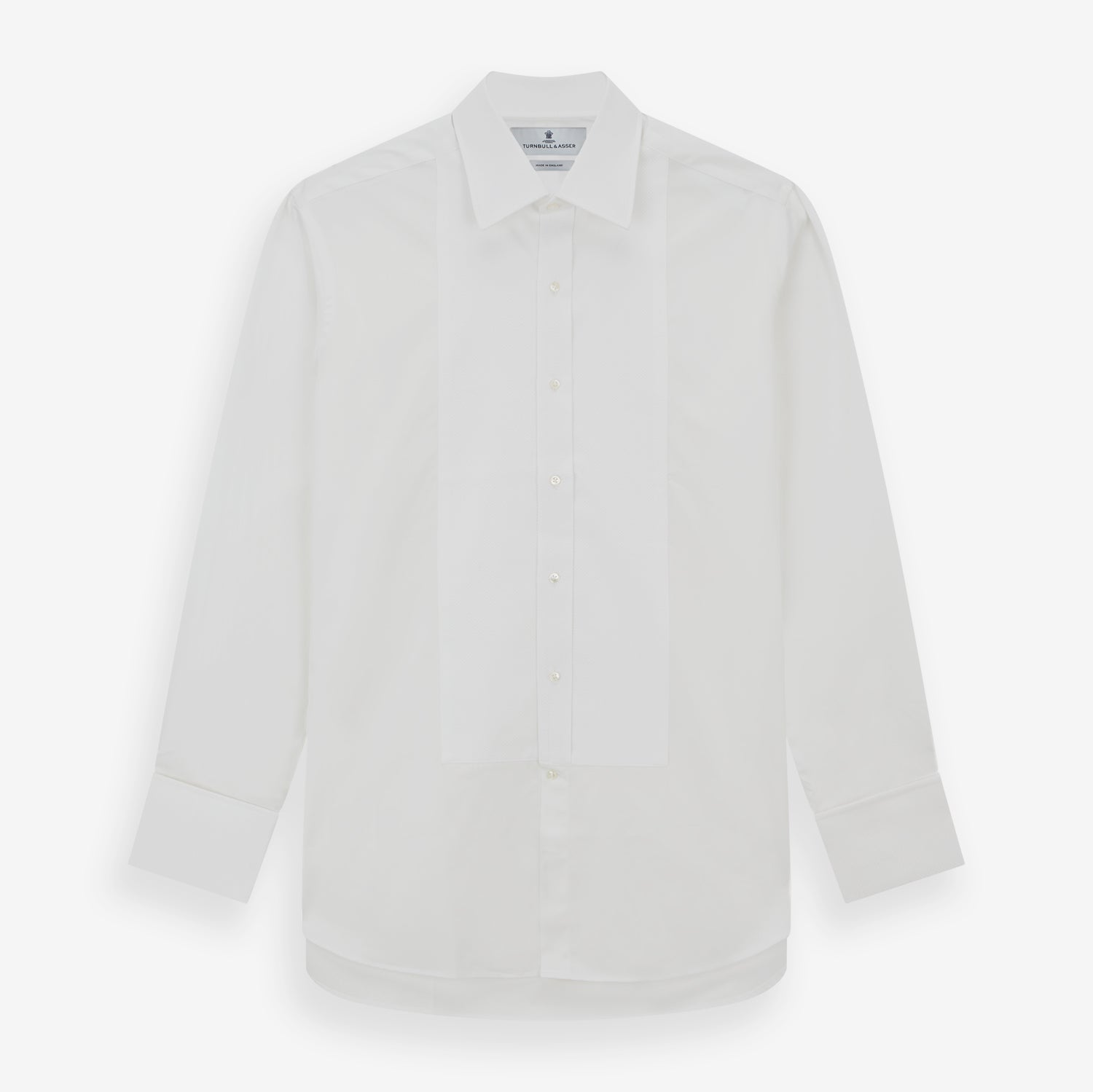 View 1 of product The Turnbull & Asser White Marcella Dress Shirt features a T&A collar, double cuffs, a classic bib front, and a button-down design—ideal for formal occasions. Displayed against a plain white background.