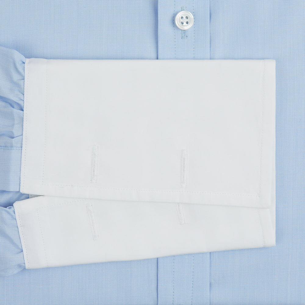 Turnbull & Asser Light Blue End-on-End Shirt features a contrast T&A white collar, double cuffs, long sleeves, and button-down front. Displayed on a plain white background.