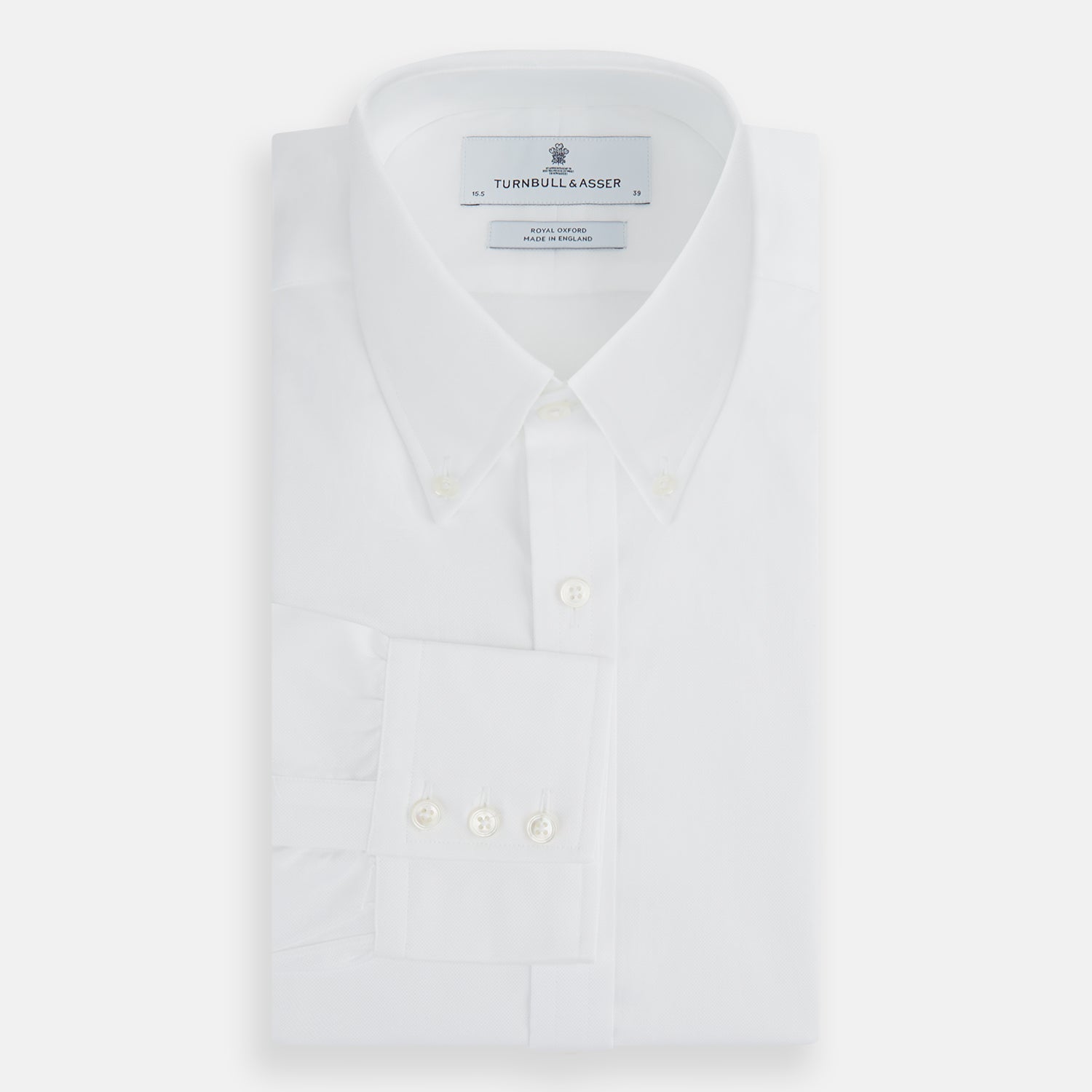 View 5 of product The White Royal Oxford Cotton Shirt by Turnbull & Asser features a button-down collar and 3-button cuffs—ideal for minimalist looks. Shown against a plain white background.