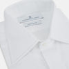 View 2 of product The Turnbull & Asser Casino Royale White Dress Shirt, as seen on James Bond, features long sleeves, a button-down front, and classic collar and cuffs. Displayed against a plain white background.