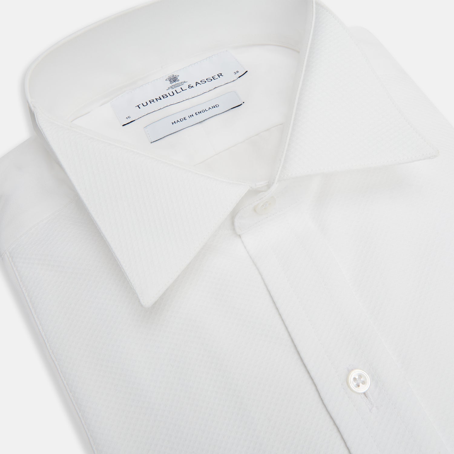 View 2 of product The Turnbull & Asser White Cotton Dress Shirt features a wing collar, double cuffs, and is displayed on a plain white background.