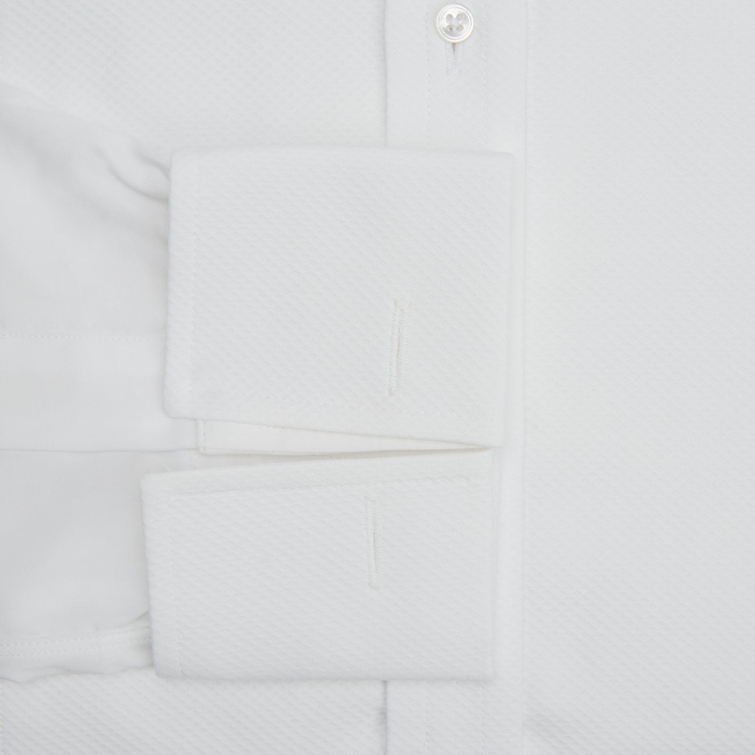 View 3 of product The Turnbull & Asser White Cotton Dress Shirt features a wing collar, double cuffs, and is displayed on a plain white background.