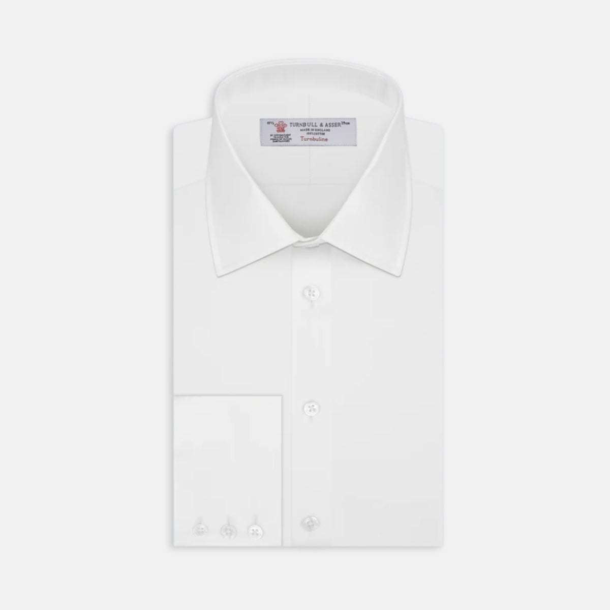 View 1 of product The Turnbull & Asser White Herringbone Superfine Cotton Shirt with T&A collar and 3-button cuffs is perfect for pairing with statement ties or elevating minimalist looks.