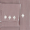 View 4 of product The Turnbull & Asser Burgundy Micro Check Winston Shirt is a long-sleeved, button-up Mayfair fit dress shirt with a collar and buttoned cuffs, featuring a small red and white check pattern and shown on a white background.