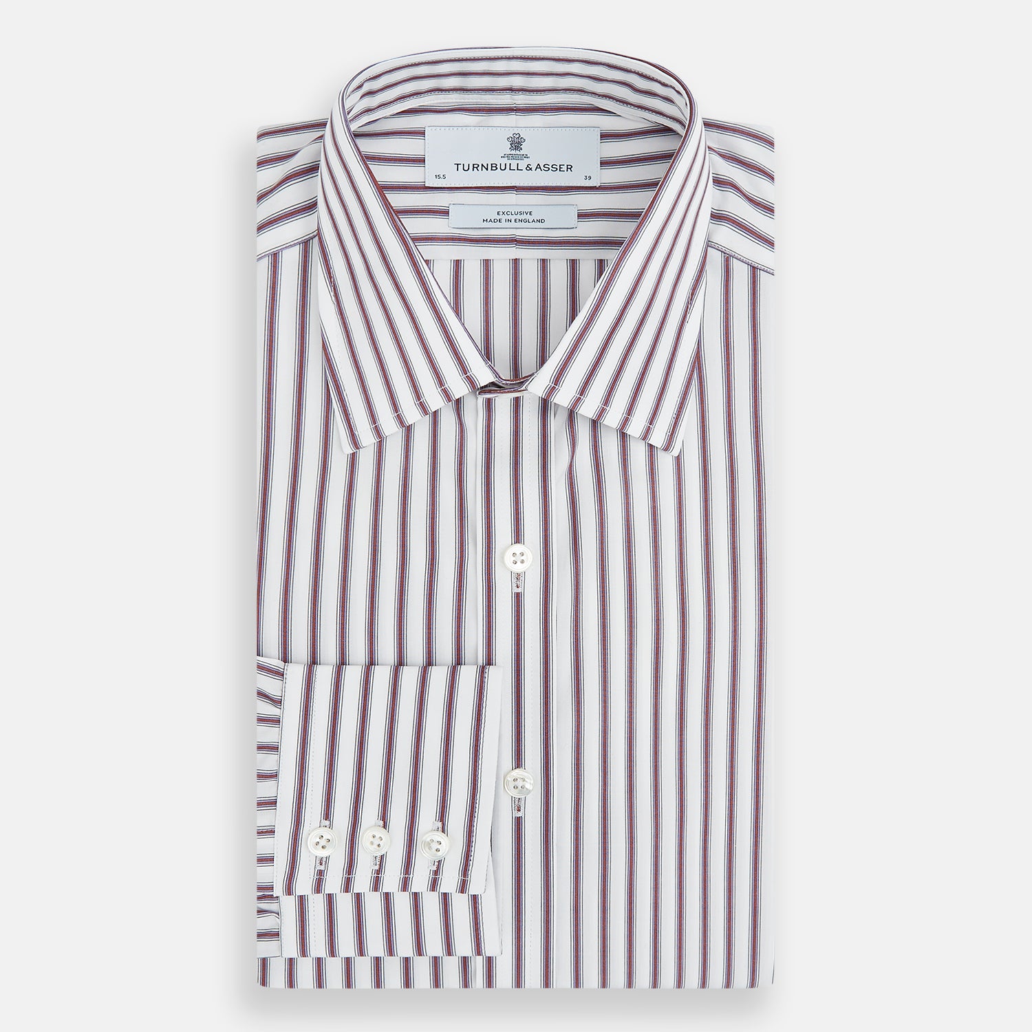 View 5 of product The Turnbull & Asser Burgundy Track Stripe Winston Shirt features long sleeves, classic collar, buttoned cuffs, and vertical white and dark maroon stripes—perfect for formal wear and shown laid flat against a white background.