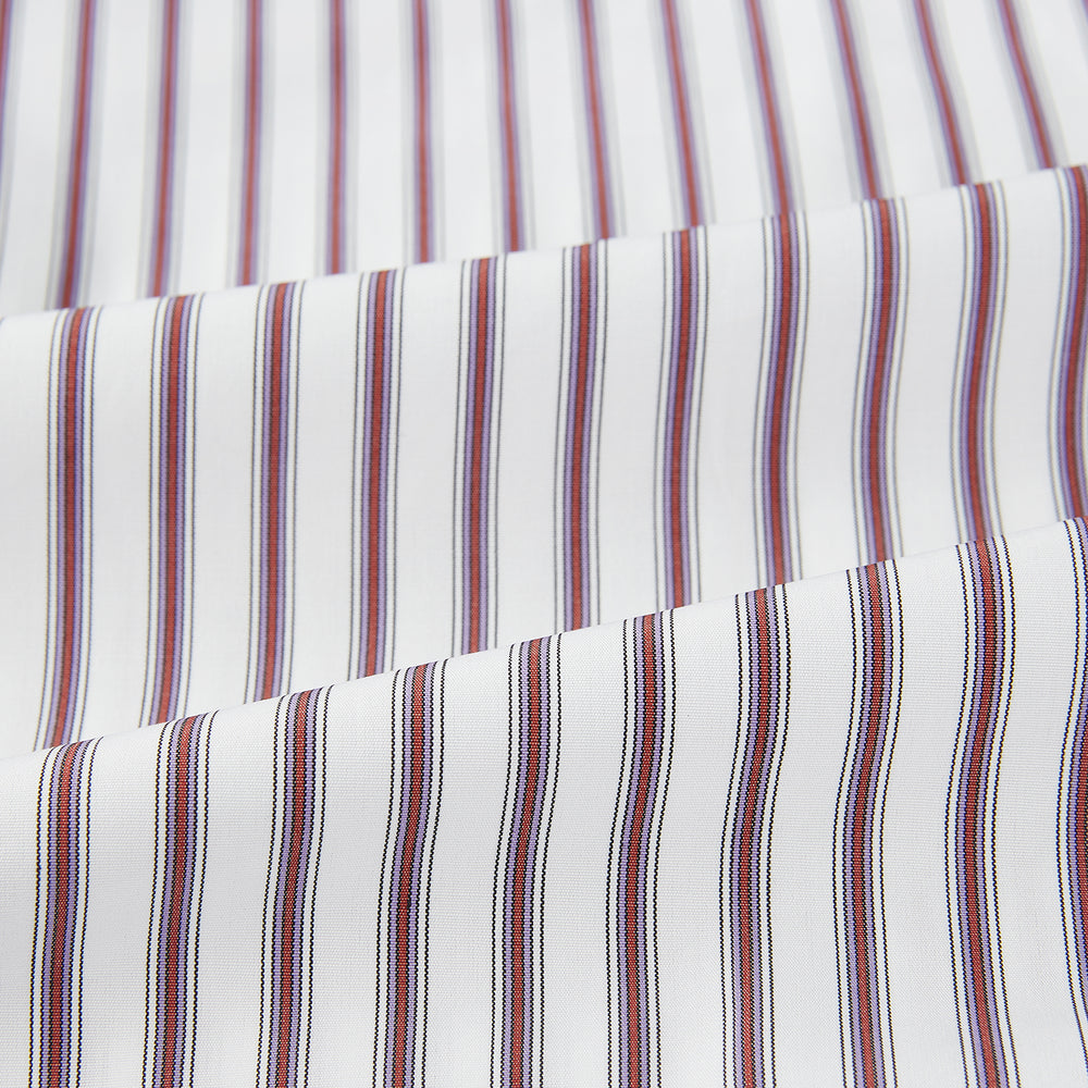 The Turnbull & Asser Burgundy Track Stripe Winston Shirt features long sleeves, classic collar, buttoned cuffs, and vertical white and dark maroon stripes—perfect for formal wear and shown laid flat against a white background.