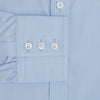 View 3 of product The Turnbull & Asser Light Blue End-on-End Shirt, featuring a T&A collar and 3-button cuffs, is laid flat on a white background—perfect for smart looks or complementing your favorite navy suit.