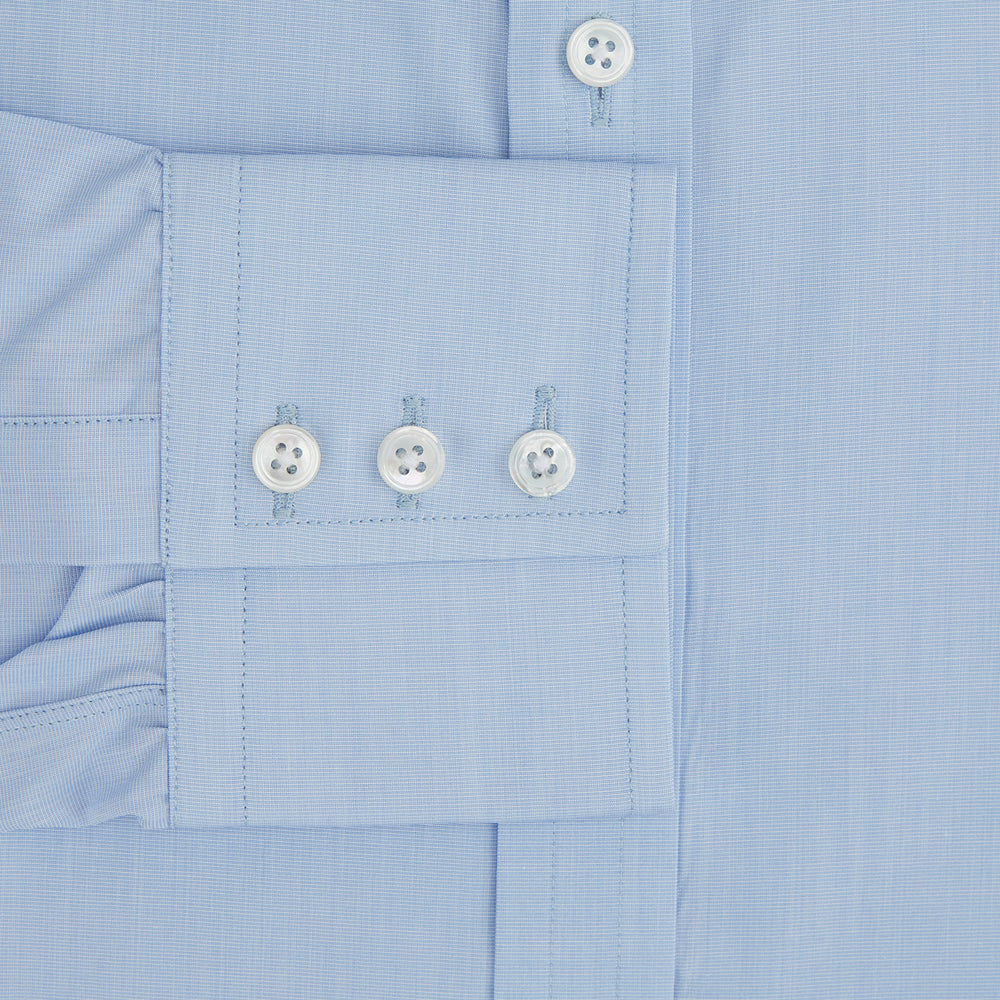 The Turnbull & Asser Light Blue End-on-End Shirt, featuring a T&A collar and 3-button cuffs, is laid flat on a white background—perfect for smart looks or complementing your favorite navy suit.