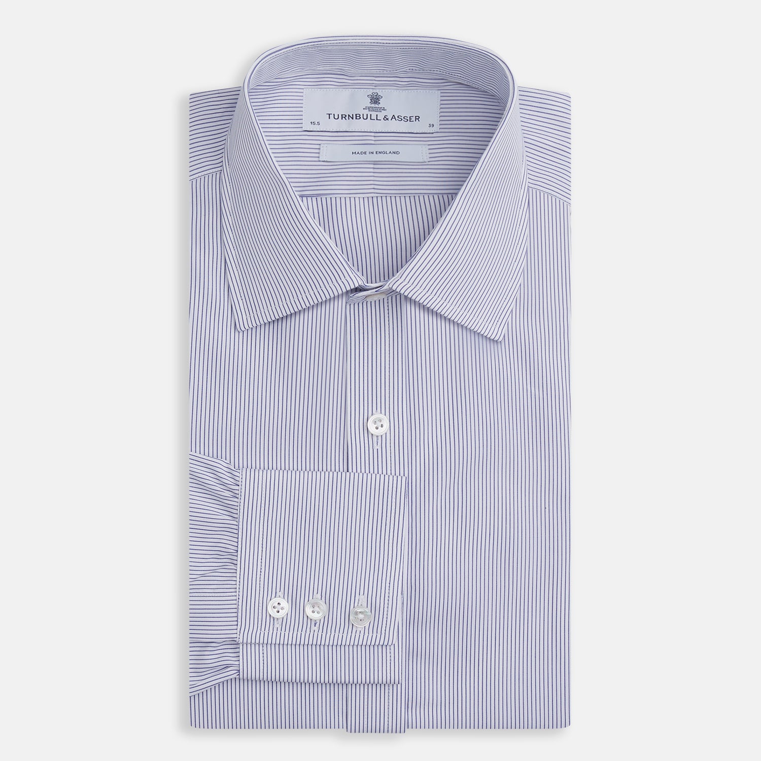 View 4 of product The Turnbull & Asser Blue Pinstripe Mayfair Shirt is a cotton poplin, long-sleeve button-down with a classic collar and white buttons, shown laid flat on a white background.