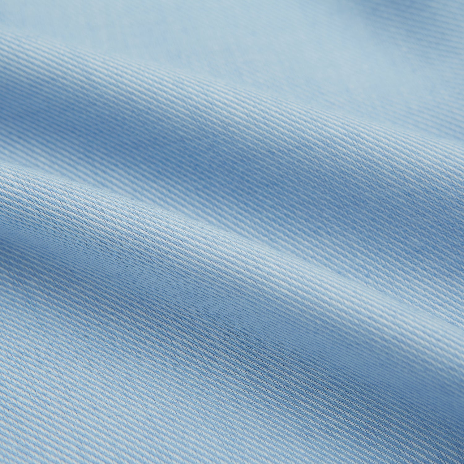 View 6 of product The Turnbull & Asser Blue Cotton Cashmere Mayfair Shirt features long sleeves, a classic collar, buttoned cuffs, and white buttons, shown against a white background.