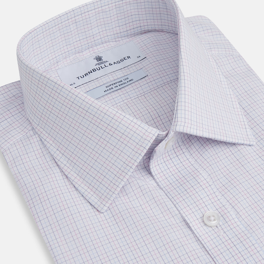 The Turnbull & Asser Red and Blue Tattersall Check Mayfair Shirt features long sleeves, cotton poplin fabric, a pointed collar, and buttoned cuffs, displayed flat on a white background.