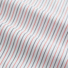 View 5 of product The Turnbull & Asser Red and Navy Pinstripe Mayfair Shirt, an organic cotton long-sleeve button-up with a collar, features thin vertical red and navy pinstripes on white, shown laid flat on a white surface.
