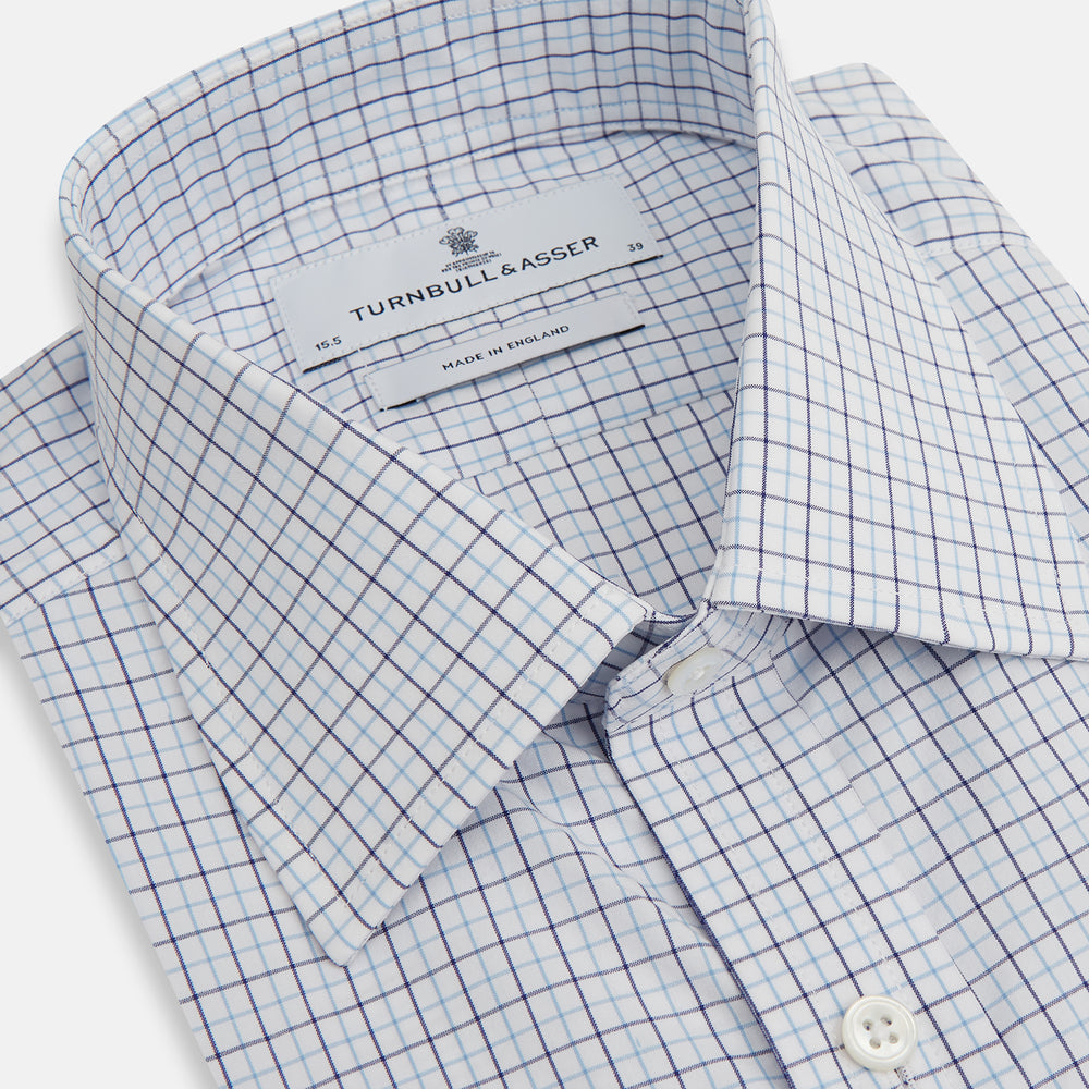 The Blue Double Graph Check Mayfair Shirt by Turnbull & Asser is a long-sleeved, classic-collar, button-up made from organic cotton with a left chest pocket, shown on a white background.