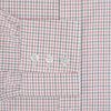 View 3 of product The Turnbull & Asser Red and Navy Graph Check Mayfair Shirt is a long-sleeved organic cotton button-up featuring a collar, buttoned cuffs, and a small red and navy check pattern, shown against a plain white background.