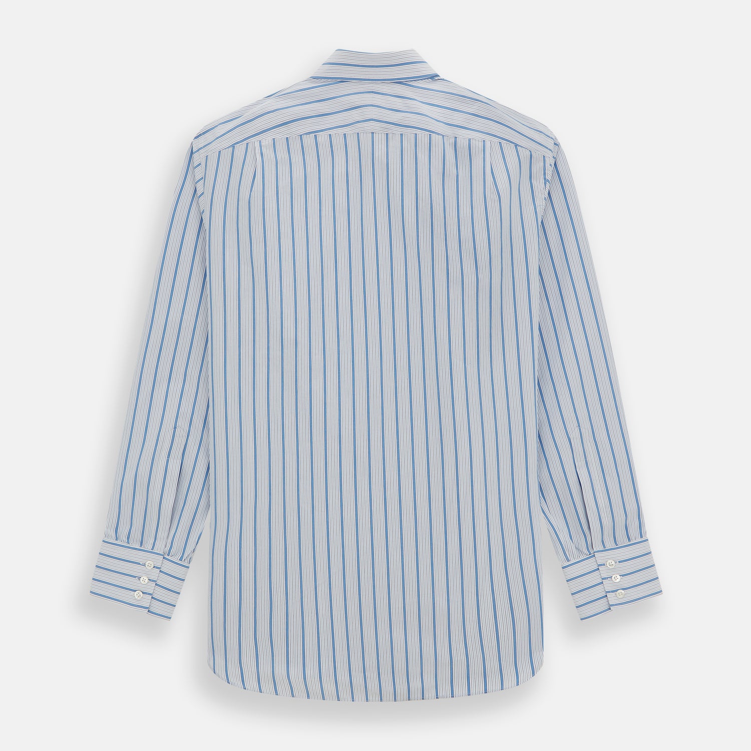 View 5 of product The Turnbull & Asser Blue Multi Track Stripe Mayfair Shirt is a button-up, long-sleeve shirt in white organic cotton with blue vertical stripes, classic collar, and buttoned cuffs.