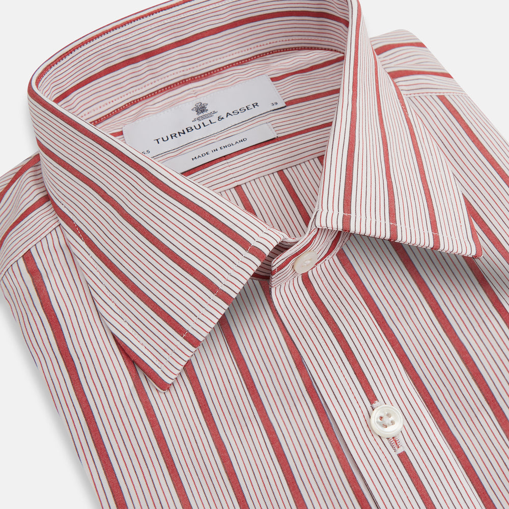 The Red Multi Track Stripe Mayfair Shirt by Turnbull & Asser is a long-sleeved, collared button-up featuring vertical red stripes on white and horizontal red stripes on the cuffs.