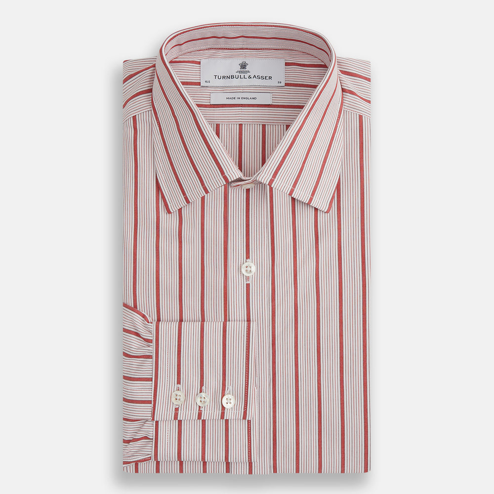 The Red Multi Track Stripe Mayfair Shirt by Turnbull & Asser is a long-sleeved, collared button-up featuring vertical red stripes on white and horizontal red stripes on the cuffs.