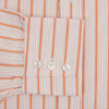 View 3 of product The Orange Graph Overlay Check Mayfair Shirt by Turnbull & Asser is a long-sleeved organic cotton button-up with orange and white stripes, a collar, and wide cuffs—ideal for elevating your wardrobe. Shown against a white background.