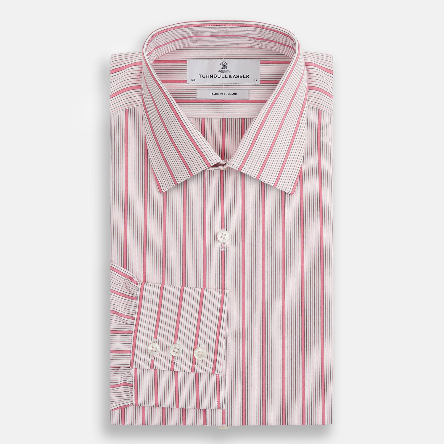 View 4 of product The Turnbull & Asser Pink Multi Track Stripe Mayfair Shirt features long sleeves, a button-down front, classic collar, and buttoned cuffs with red and pink stripes on white, neatly displayed on a light background.