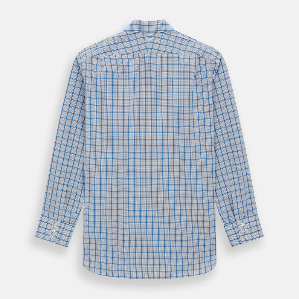 The Turnbull & Asser Blue Graph Overlay Check Mayfair Shirt features long sleeves, a spread collar, buttoned cuffs, and a blue and white plaid pattern, shown against a plain white background.